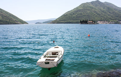 Boat in sea against sky