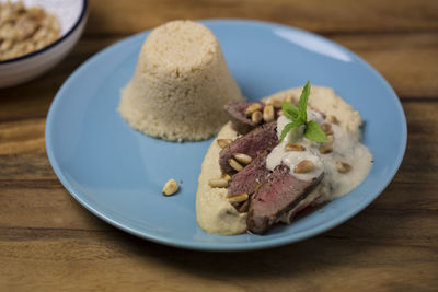 Close-up of food in plate on table