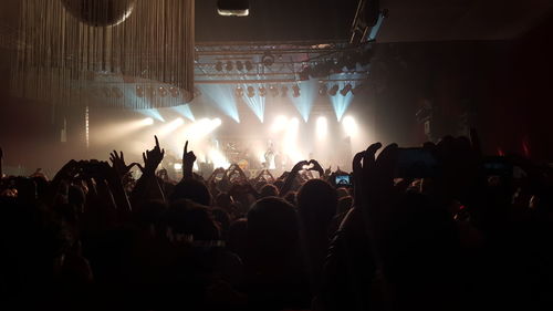 People enjoying at music concert