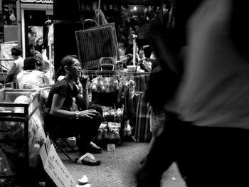 Woman sitting in market