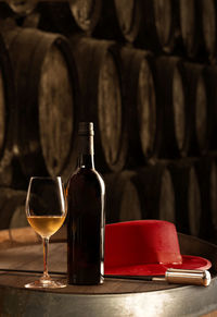 Close-up of wine bottles on table