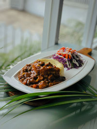 Close-up of food in plate on table