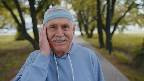 Portrait of senior man with headband