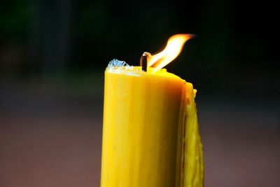 Close-up of candle burning