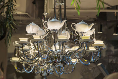 Close-up of lamps hanging in row