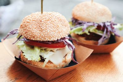 Close-up of hamburgers on table