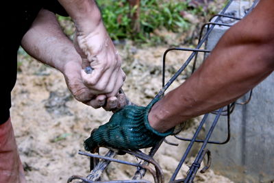 Midsection of man working