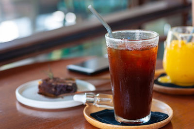 Close-up of drink served on table