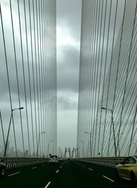 View of suspension bridge against sky