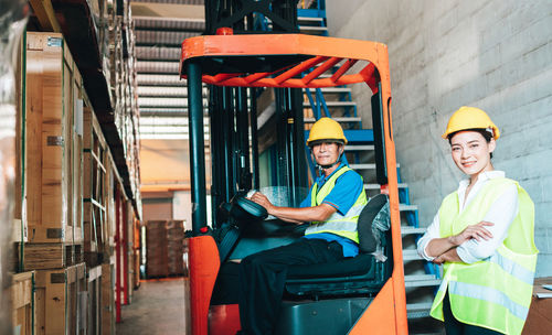 Portrait of people working at construction site