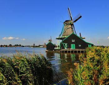 Traditional windmill against clear sky