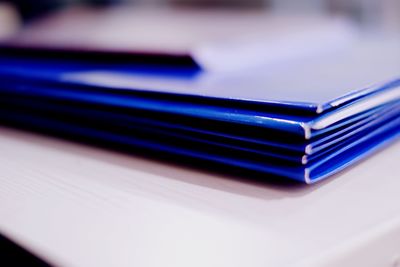 Close-up of stack of books on table