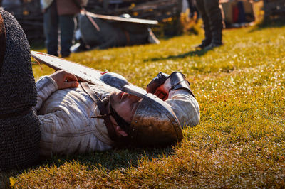 People relaxing on field