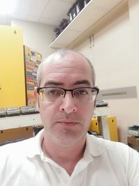 Portrait of man wearing eyeglasses