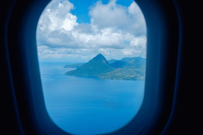 View of airplane wing against sky