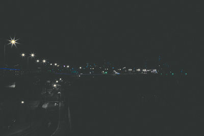 View of illuminated city at night