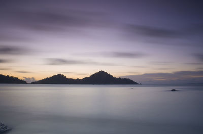 Scenic view of sea against sky at sunset