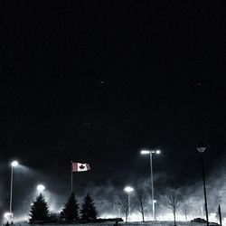 Low angle view of illuminated street light