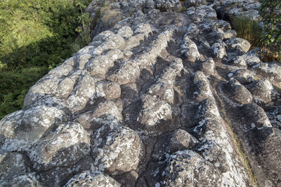 High angle view of stones on rock