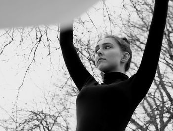 Portrait of a young woman looking away