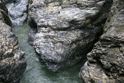 High angle view of rock formation at sea shore