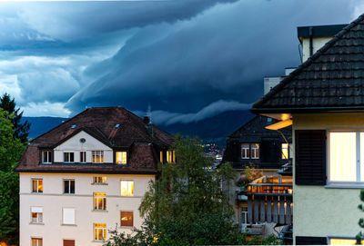 Houses and buildings against sky