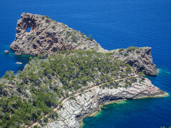 Scenic view of sea against blue sky