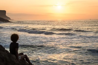 Scenic view of sea against sky during sunset