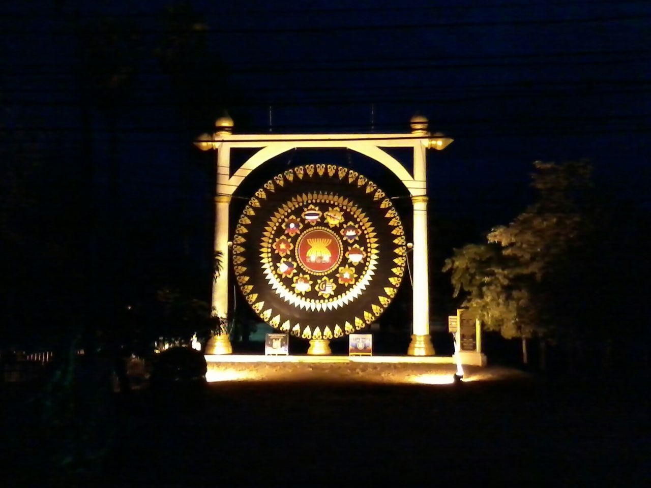 illuminated, night, indoors, built structure, architecture, dark, low angle view, ornate, lighting equipment, decoration, building exterior, lantern, arts culture and entertainment, religion, history, circle, light - natural phenomenon, no people, place of worship, old-fashioned