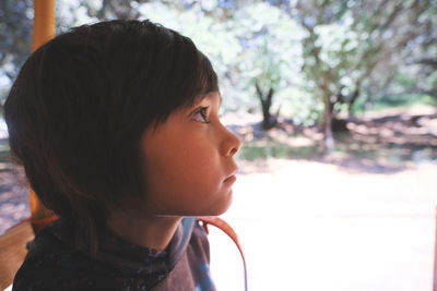 Close-up of thoughtful boy looking away