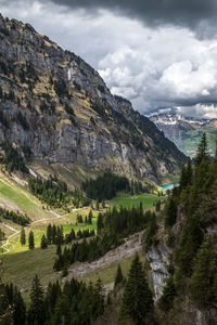 Scenic view of landscape and mountains against sky