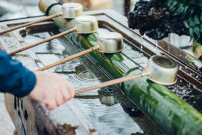 High angle view of hand holding fountain