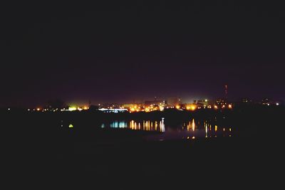 Illuminated cityscape at night