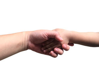 Cropped image of people hand against white background