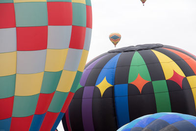 Hot air balloons flying against clear sky