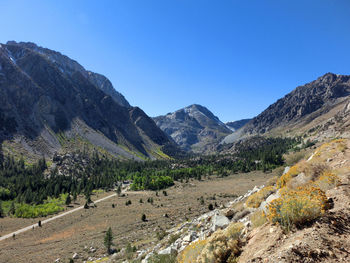 Idyllic shot of mountains against clear blue sky