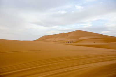 Scenic view of desert against sky