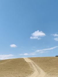 Scenic view of desert against sky