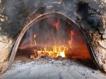 Close-up of burning fire on wood