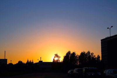 Silhouette of building at sunset