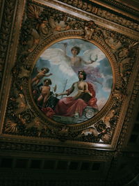 Low angle view of ornate ceiling