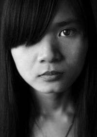 Close-up portrait of young woman