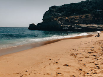 Scenic view of sea against clear sky