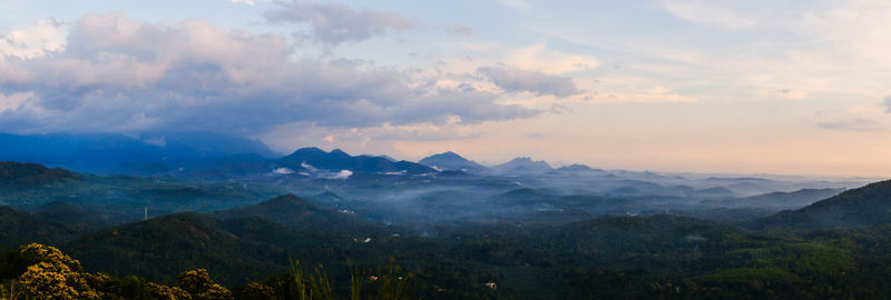 Scenic view of mountains against sky during sunset