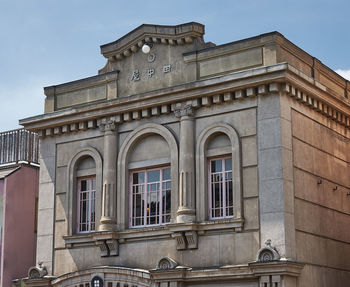 Low angle view of historical building against sky