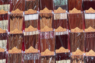 Full frame shot of colorful chopsticks for sale in store