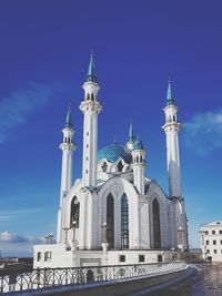 Low angle view of building against blue sky