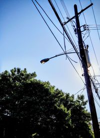 Low angle view of electricity pylon