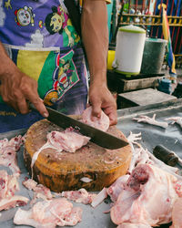 Midsection of person preparing food