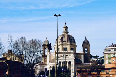 View of buildings in city against sky